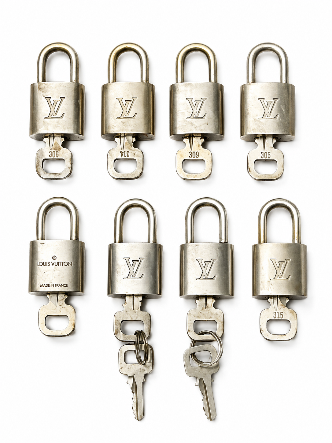 Louis Vuitton brass padlock with matching key #314.