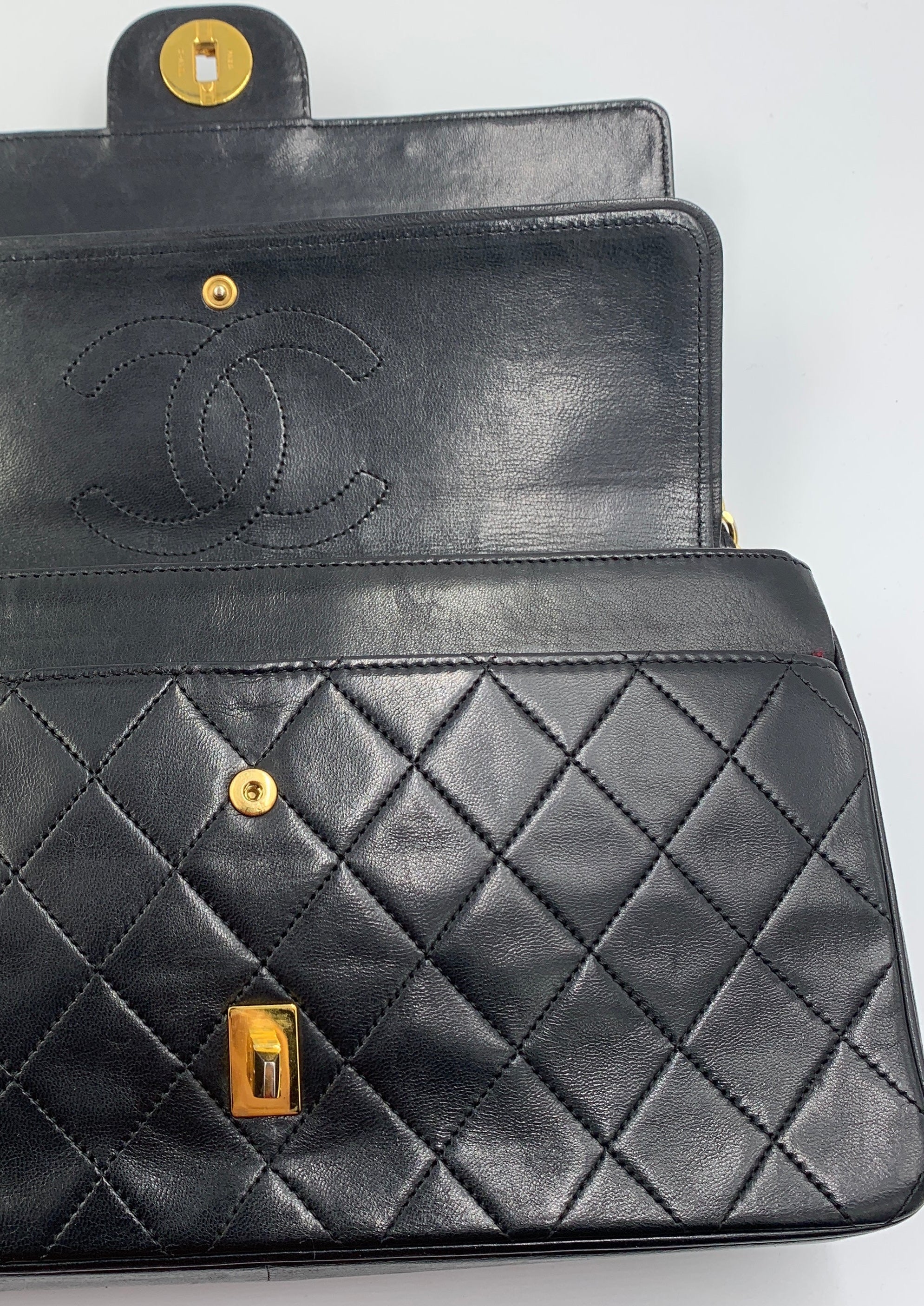 CHANEL MATELASSE TURN LOCK DOUBLE FLAP BLK ON BLCK GOLD HARDWARE
