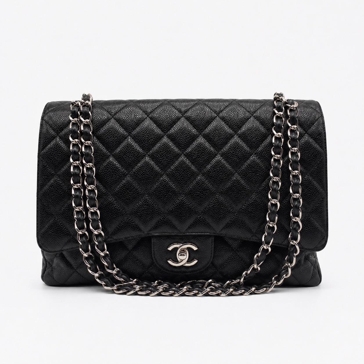 Chanel Maxi Classic Double Flap in black silver-tone hardware | Vintage