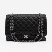 Chanel Maxi Classic Double Flap in black silver-tone hardware | Vintage