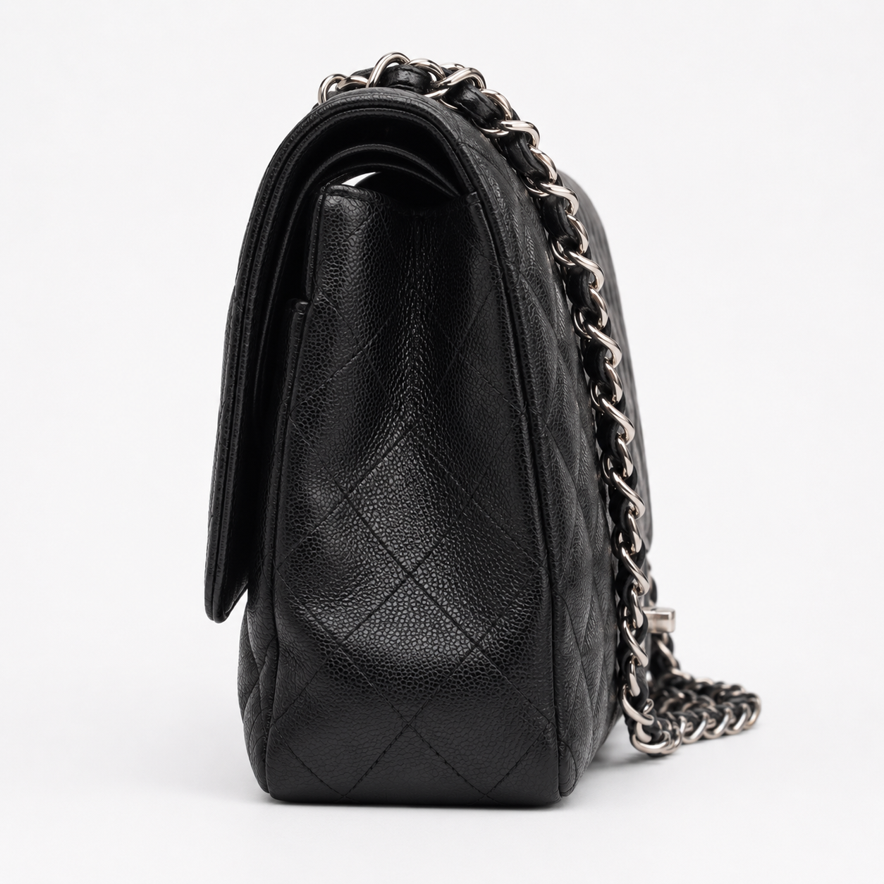 Chanel Maxi Classic Double Flap in black silver-tone hardware | Vintage