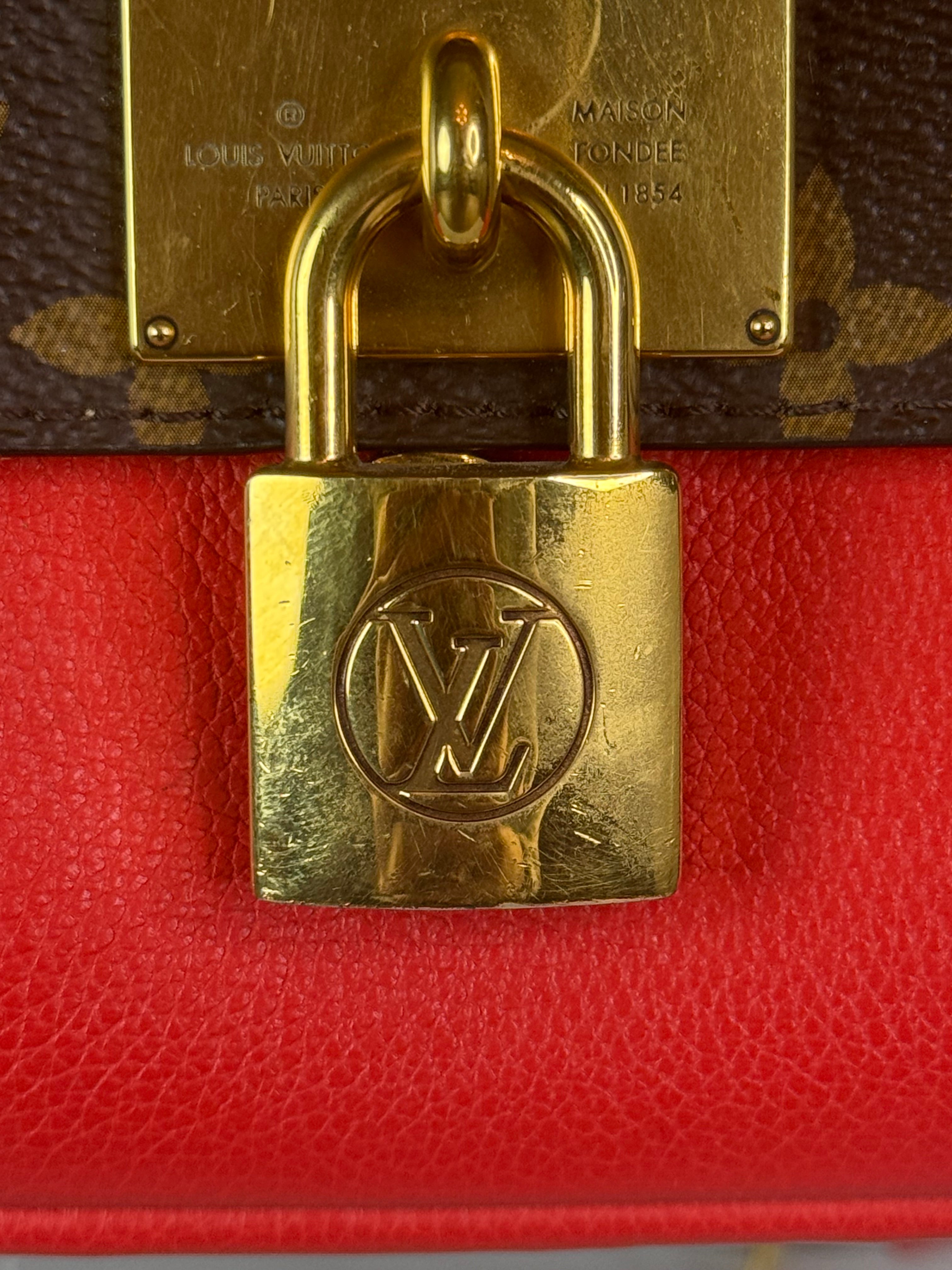LOUIS VUITTON LV
Coquelicot Monogram Canvas Locky BB Bag