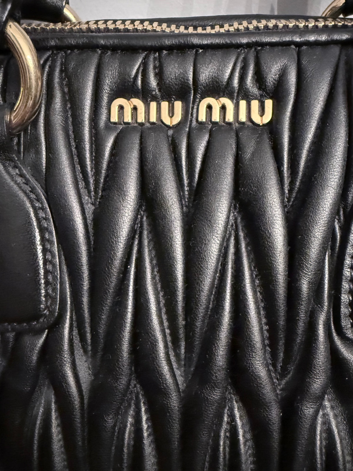 Miu Miu Black Quilted Leather Handbag with Gold Hardware