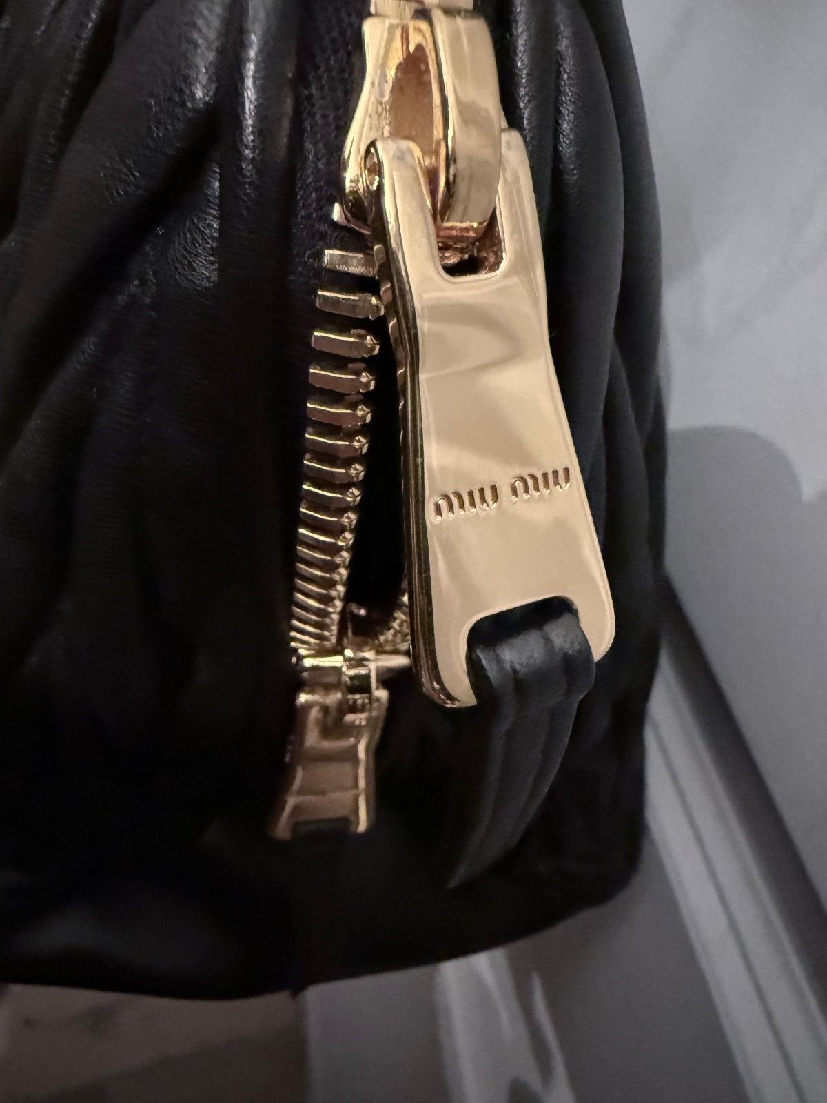 Miu Miu Black Quilted Leather Handbag with Gold Hardware