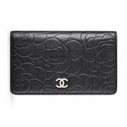 Chanel black Camellia embossed long wallet